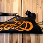 leather quiver in black and yellow with viking norse celtic knot