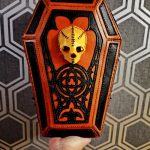 leather coffin bag with a skull